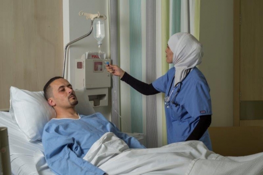 A Nurse Checking on Patient at Hospital