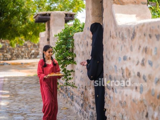 Girl carrying late |-