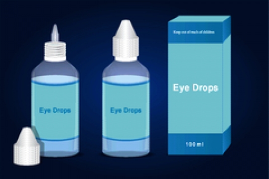set of eye drops bottle isolated on blue background