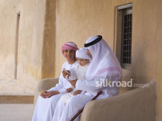 Little boy taking money for Eid|-