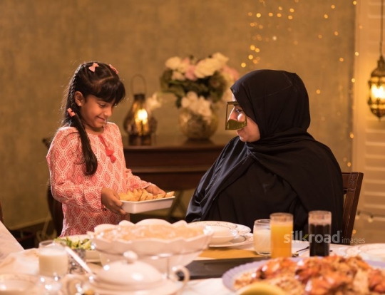 Granddaughter serving puff pastry|-