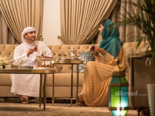Arabic couple enjoying suhoor time|-