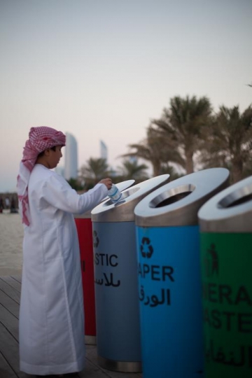 boy trashing a bottle properly