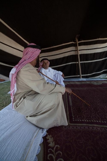 men sitting in a traditional a