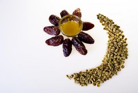 dates and coffee beans isolated on white background