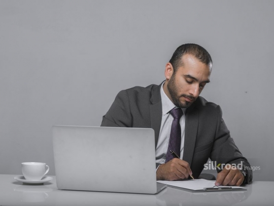 Businessman signing agreement