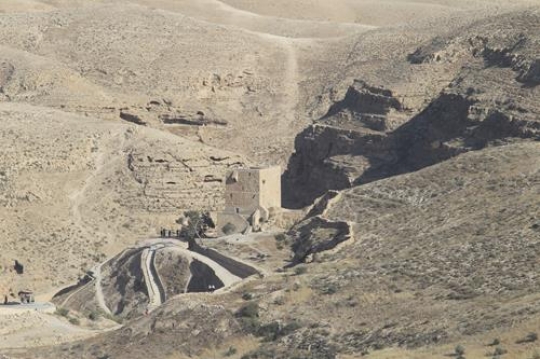 view of justinian watchtower, of greek orthodox monastery with stairway road 