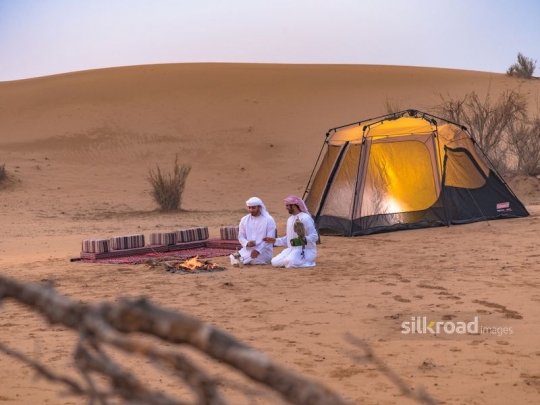 Friends having arabic coffee