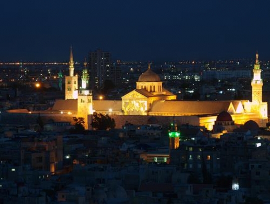 lit church in the night in damascus