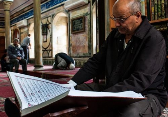 people praying in jazzar pasha