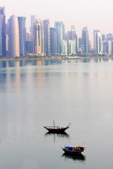 a dhow returns to harbour in d