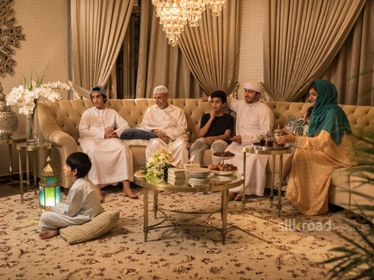 Family in the living room|-