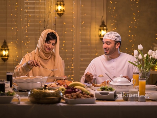 Couple enjoying traditional meal|-