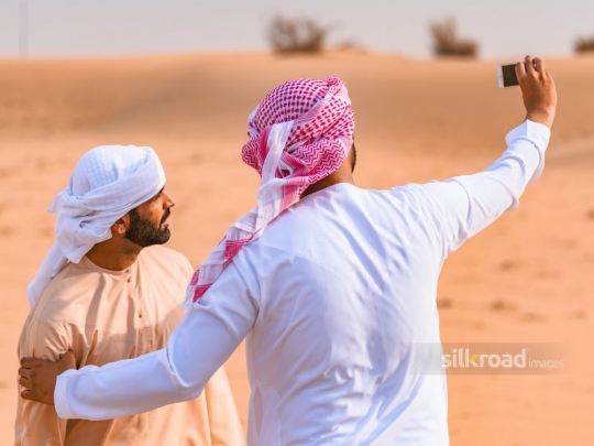 a couple of friends taking selfie