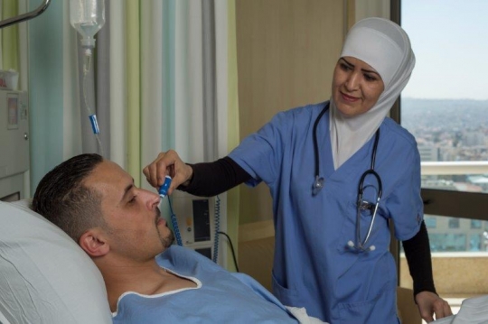 A Nurse Checking on Patient at Hospital
