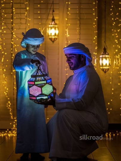Father with kid enjoying ramadan|-