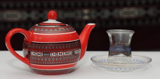 Tea pot and glass