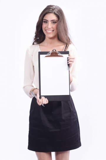 Smiling woman holding blank cl