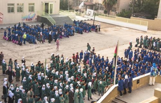 jordanian students line up in