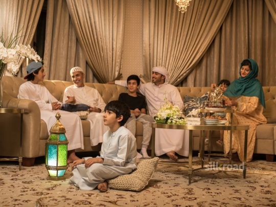 Family gathered in the living room|-