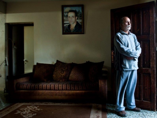 Palestinian Man Mourning on his Lost Son at Construction Site