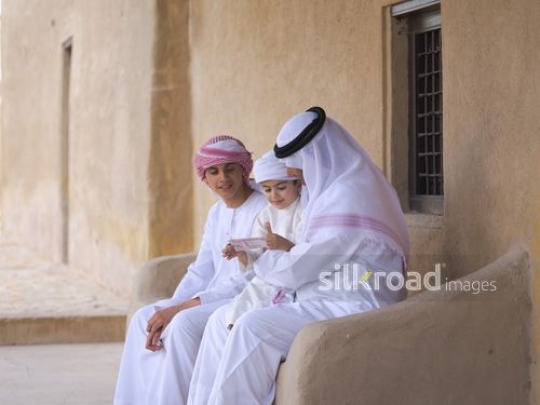 Little boy taking money for Eid|-