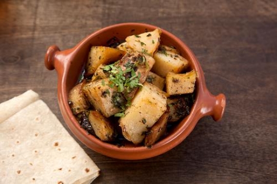 oven-baked potatoes with parsl