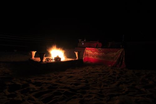 fire in a camp at night