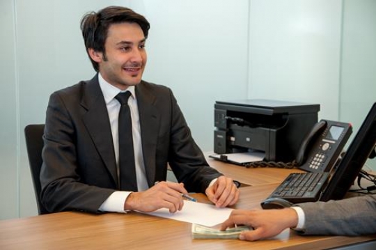 businessman negotiating with customer in an office