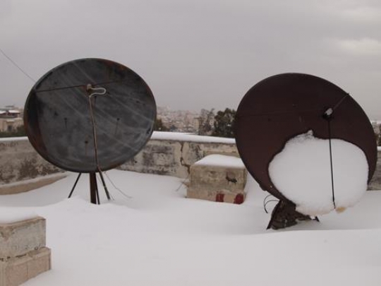 satellite dish in winter