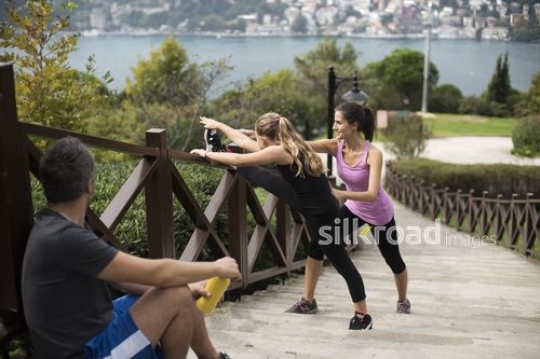 Family having rest on the stairs after sport|Spor sonrasi merdivenlerde dinlenen aile