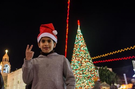 Refugee Kid Celebrating Christ
