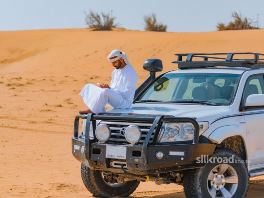 Young man resting in the desert