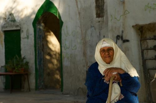 smiling senior woman looking at camera