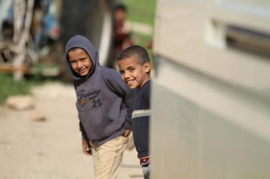 Happy little boy is playing wi