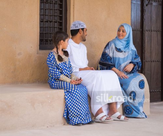 Family enjoying their time outside|-