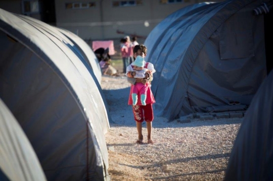 A Syrian Girl with Brother at Kobane Refugees Camp