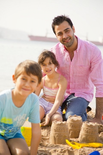 Family Building Sand Castle
