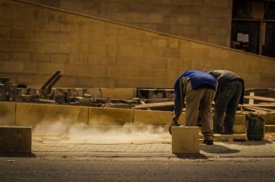 - Men Working on Road in Downtown Al-Salt