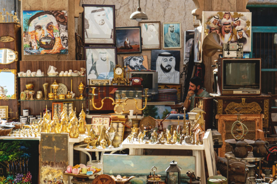 Antique Market in Old Dubai with Portraits and Vintage Items