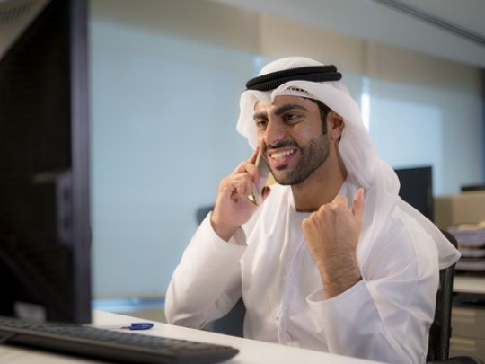 Business man excited at the worplace|