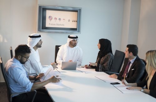 Employees talking with their boss doing their meeting|-