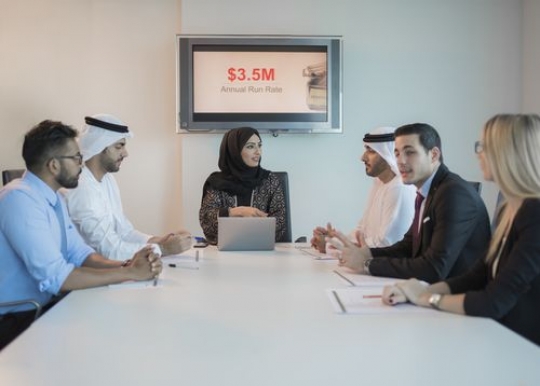 Employees at the office having a meeting|-