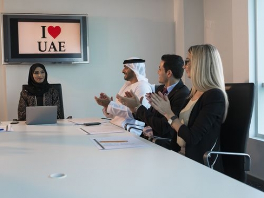 Businessmen and Business women during a meeting at the office|-