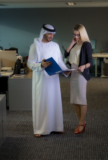 Employees checking work file|-