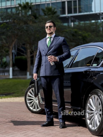 Western Businessman standing infront of his car |-