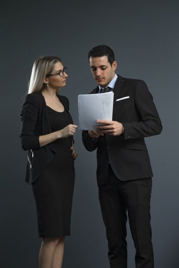 Business people standing together talking about work|