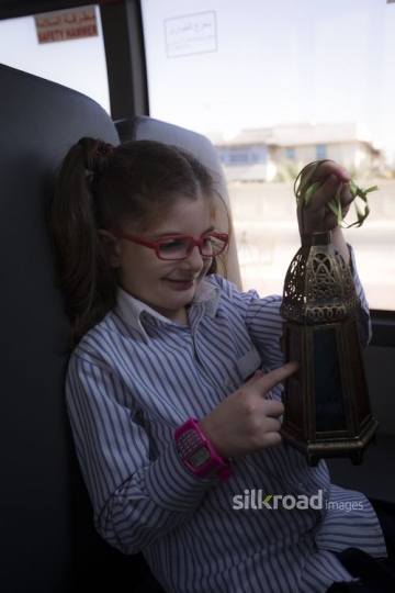 Arab kid playing with Ramadan Lantern|-