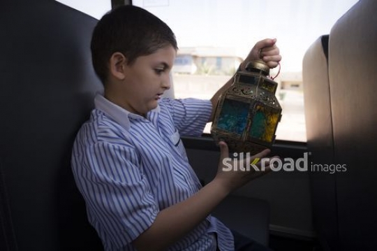 Middle Eastern student admiring the Ramadan Lantern|-