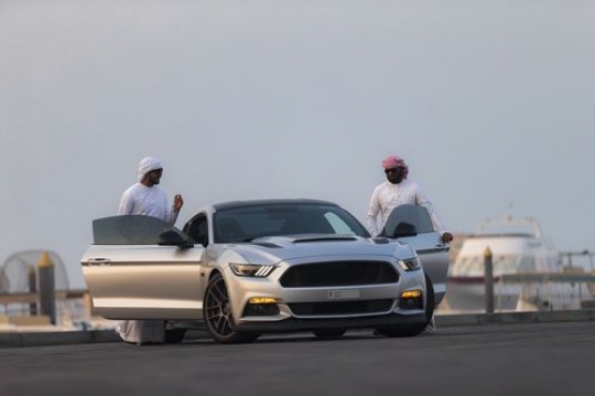 Middle eastern men exiting the car|-